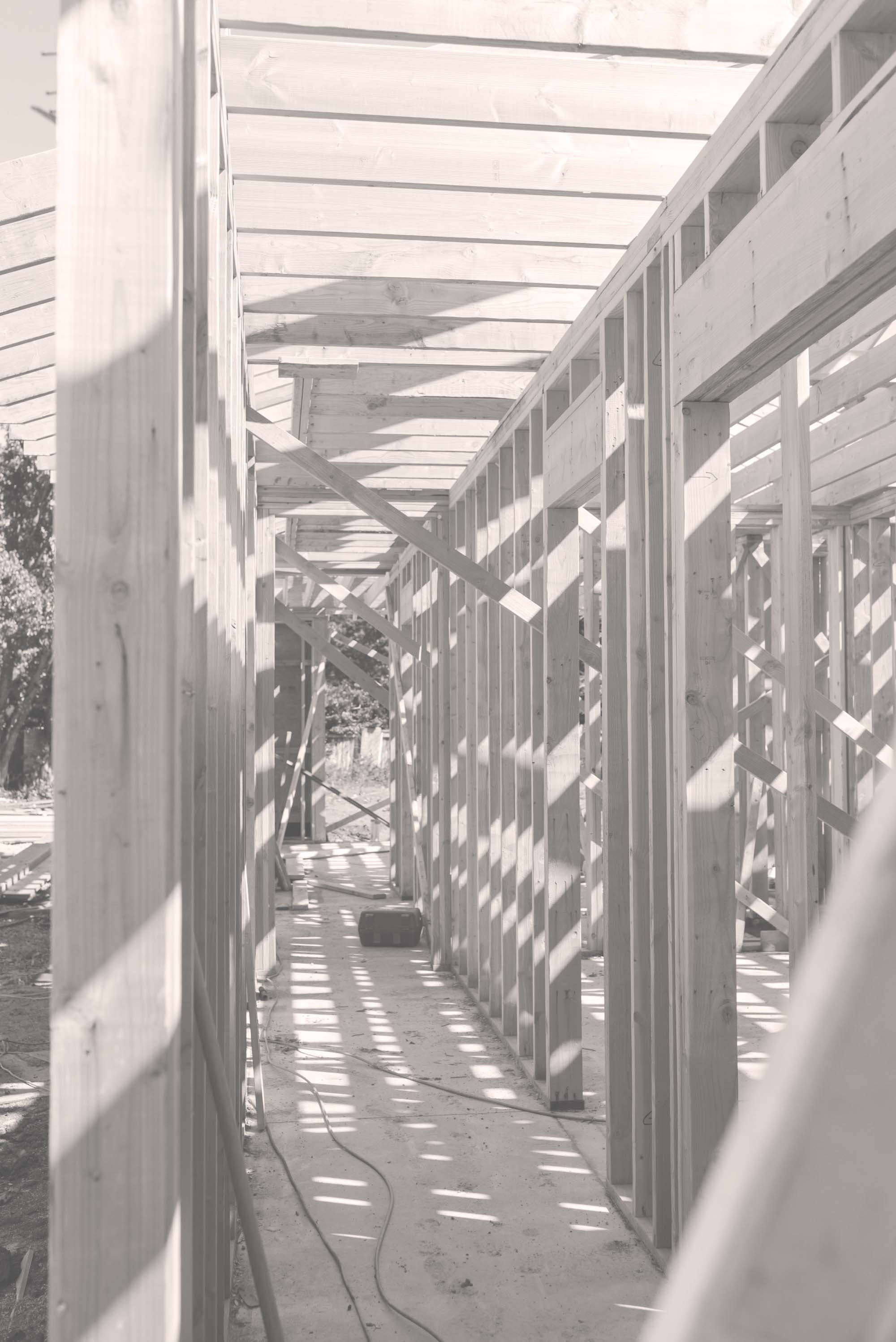 A black and white photo of a walkway.